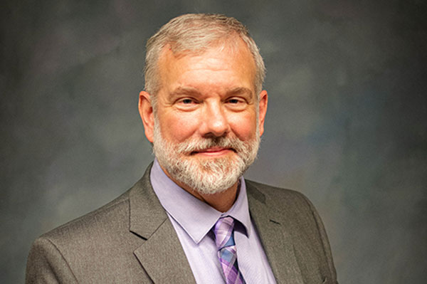 Dr. J. Alex Sider