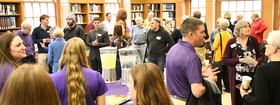 Bluffton University Open House event, room filled with alumni friends and faculty, staff of Bluffton University