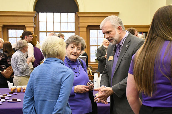 President Alex Sider speaking with alumni